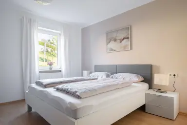 Ferienwohnung Ella - Schlafzimmer mit Doppelbett