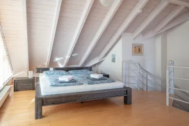 Ferienwohnung Seenest - Schlafzimmer mit Doppelbett