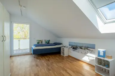 Ferienwohnung Lieblingsplatz - Zweites Schlafzimmer mit Balkonzugang