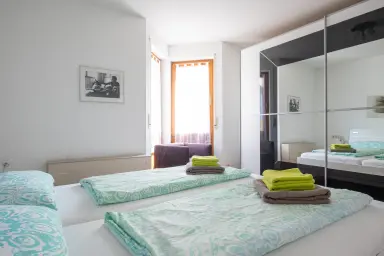 Ferienwohnung Tina - Schlafzimmer mit Doppelbett