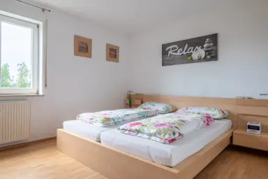 Ferienwohnung Familienoase - Erstes Schlafzimmer