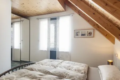 Ferienwohnung Höhenflug - Hauptschlafzimmer mit Doppelbett