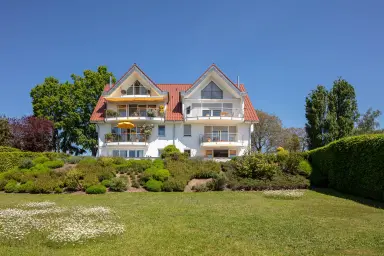 Ferienwohnung Ruheoase - Rückansicht des Hauses mit Garten