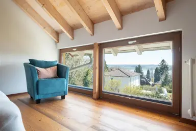 Ferienwohnung Storchennest - Seeblick im Schlafzimmer