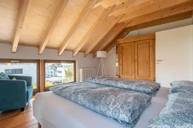 Ferienwohnung Storchennest - Freundliches Schlafzimmer