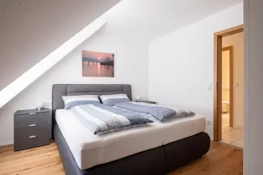 Ferienwohnung Bodenseeufer - Freundliches Schlafzimmer