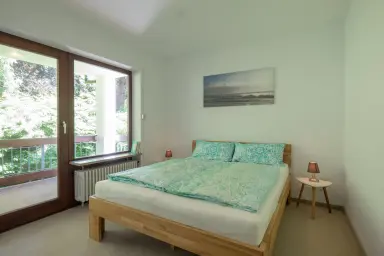 Ferienwohnung "Goldbacher Tobel" - Schlafzimmer mit Doppelbett