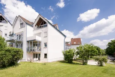 Ferienwohnung Uferresidenz - Rückseite des Hauses mit Terrasse