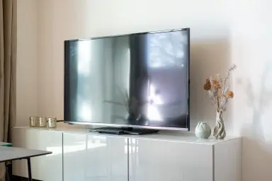 Haus Zara – Ferienwohnung Aquamarin - Moderner TV