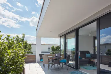 Ferienwohnung Penthouse Glückseeligkeit" - großer Balkon mit Lounge