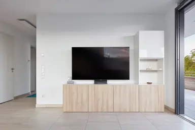 Ferienwohnung Penthouse Glückseeligkeit" - Wohnzimmer mit TV
